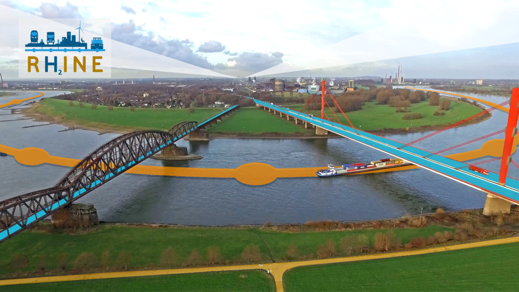 Zwei Brücken, die über den Rhein führen, darunter ein Schiff